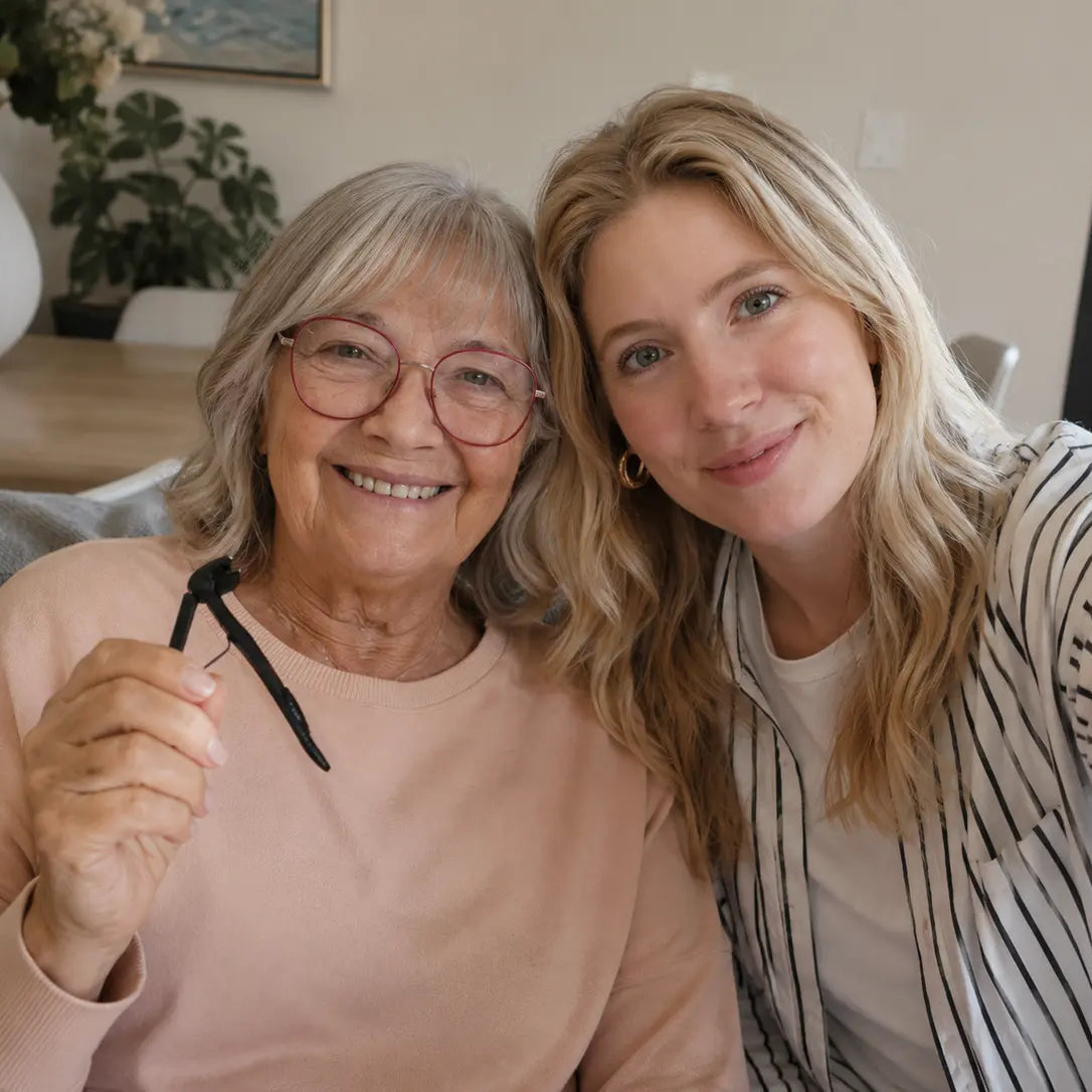 Mother and daughter smiling together at home while holding the Relievana Premium Nail Clipper Set.